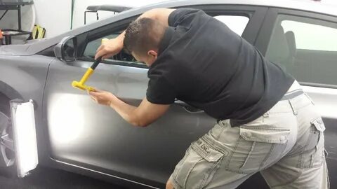 Top 7 Benefits of Professional Auto Dent Removal Service